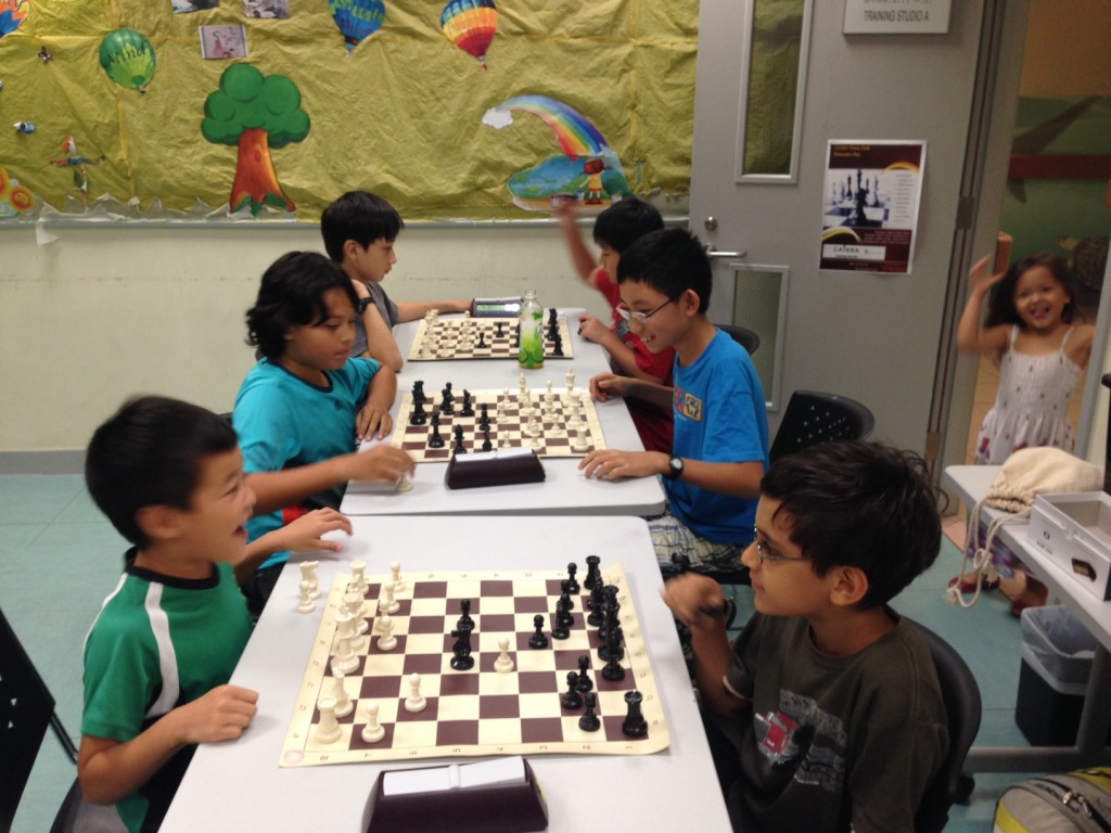 James, Rafe and Maximilien (left team) play against  Suneh, Ian and Jonathan in the last Transfer Chess match on Thursdays.