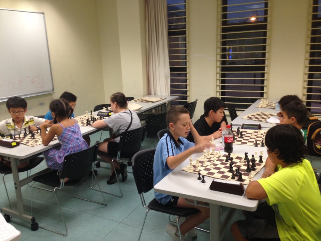 Intermediate Group players warming up before round 5 of the competition