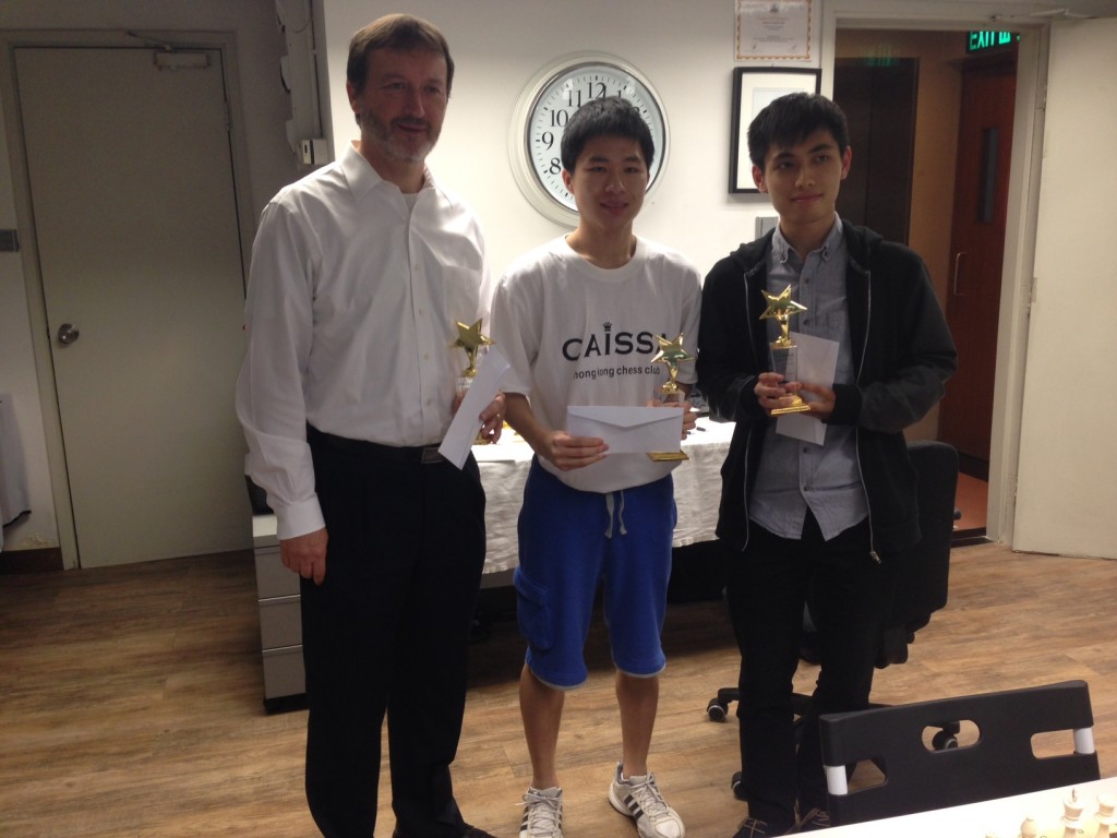 Prize Winners James, Joseph and Henry with trophies and envelopes!