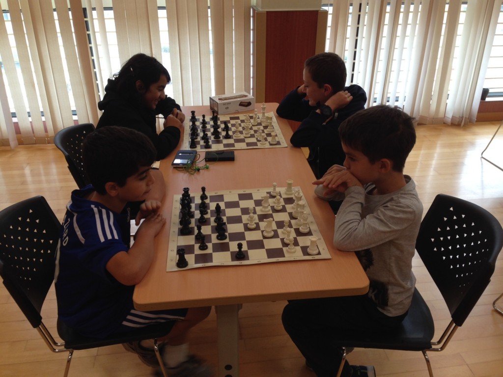 Christopher 9white) against Koza in foreground and Samira scoring her 2nd win of the day against Joshua in the back.