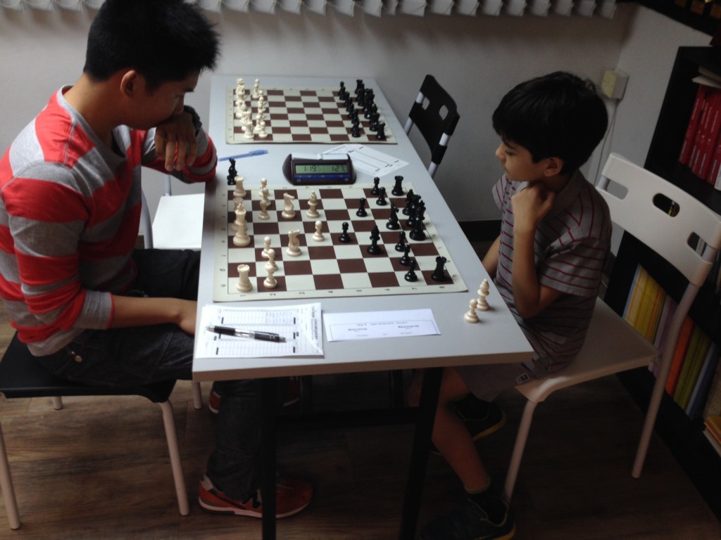 The last game of the tournament: Melvin with white against Miguel Angel in Round 7